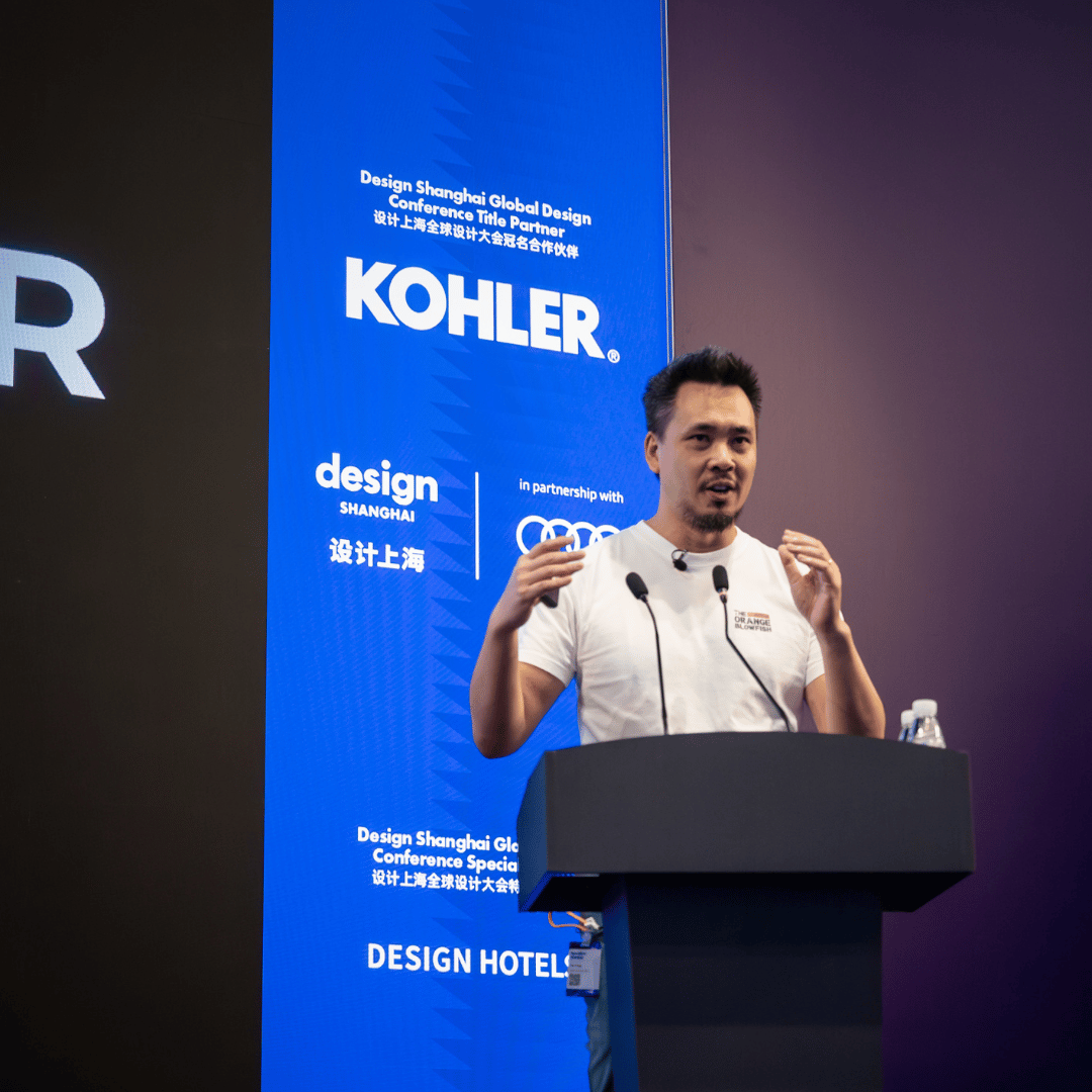 Close-up of Siu Tang speaking on stage at Design Shanghai 2025