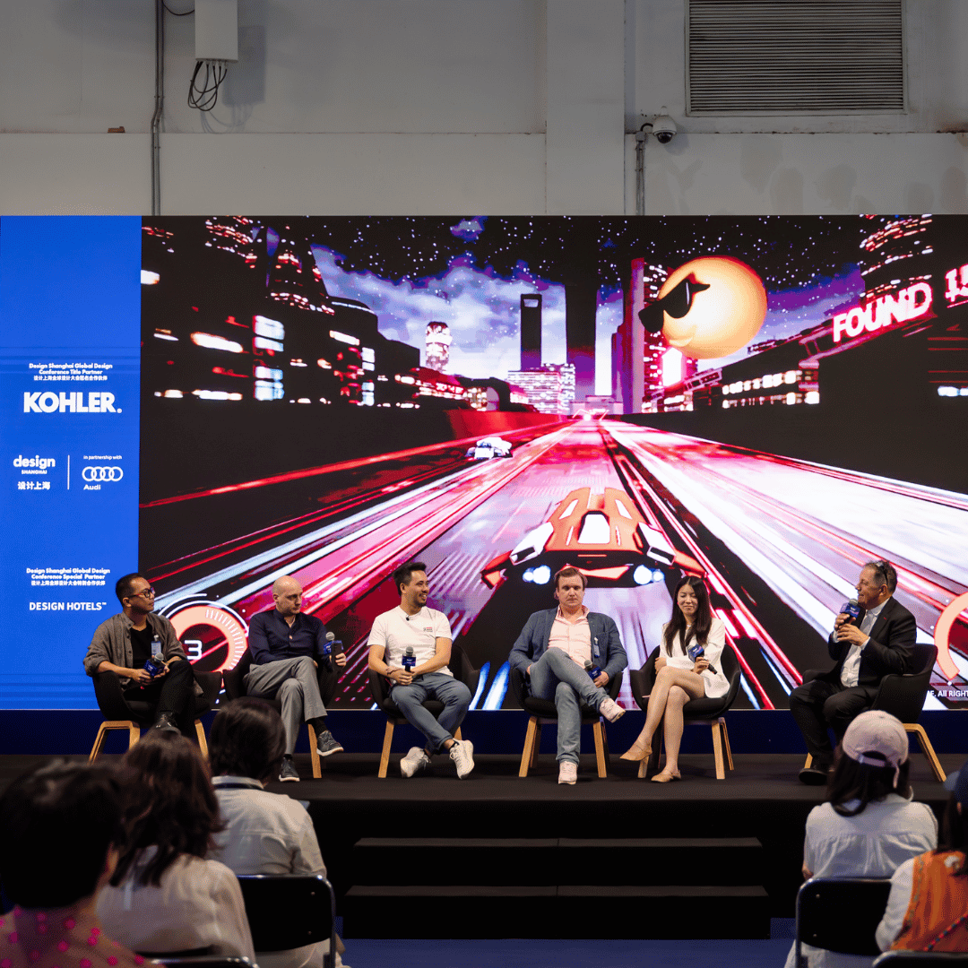 Panelists from Amazon, Heatherwick Studio, AntiStatics, Jia CURATED, and The Orangeblowfish on stage discussing the future of creativity in an AI world.