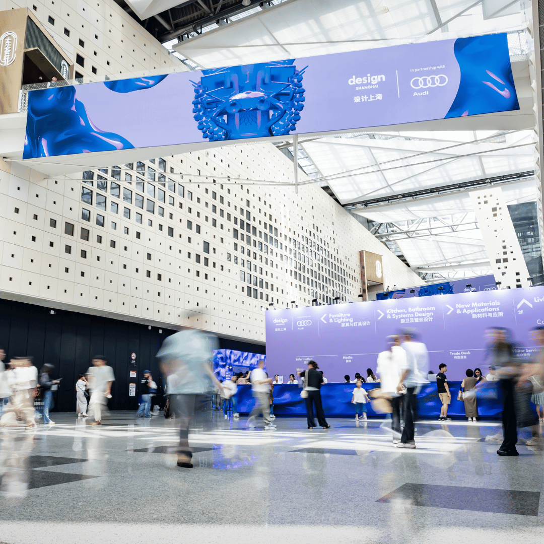 Design Shanghai 2025 lobby with visitors walking through the entrance
